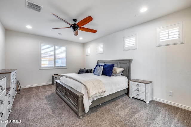 carpeted bedroom with ceiling fan