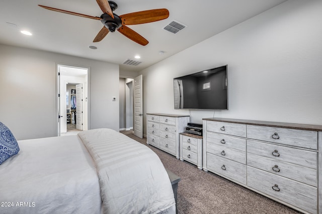 bedroom with dark colored carpet and ceiling fan