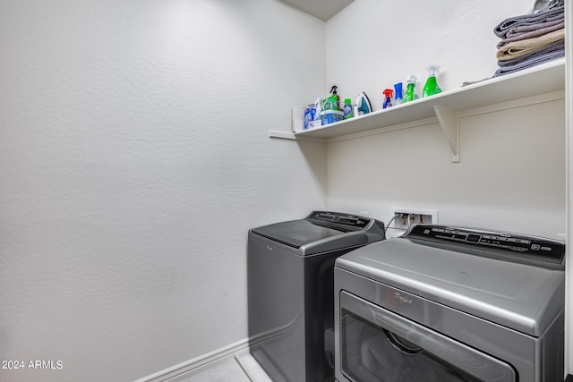 laundry room with independent washer and dryer