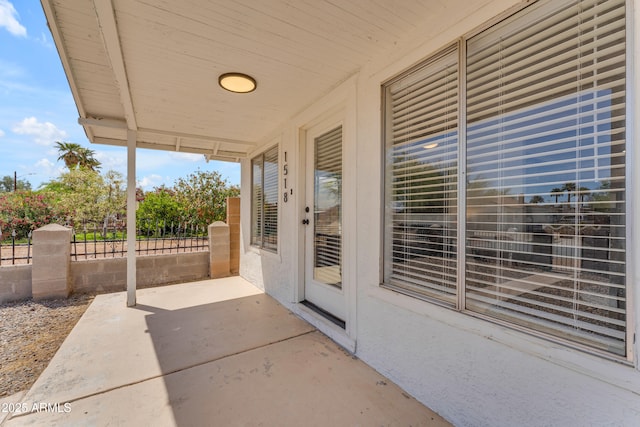 view of patio with fence
