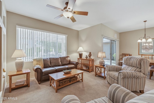 16412 W Peppertree Ct, Surprise, AZ 85387 - living room featuring plenty of natural light, light colored carpet, a chandelier, and a ceiling fan
