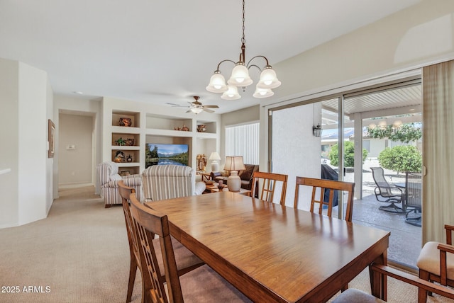 16412 W Peppertree Ct, Surprise, AZ 85387 - dining room featuring a chandelier, built in features, and ceiling fan
