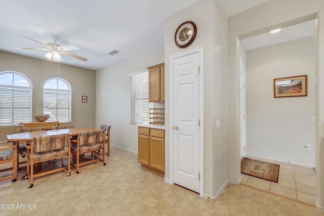 16412 W Peppertree Ct, Surprise, AZ 85387 - dining area with ceiling fan and baseboards