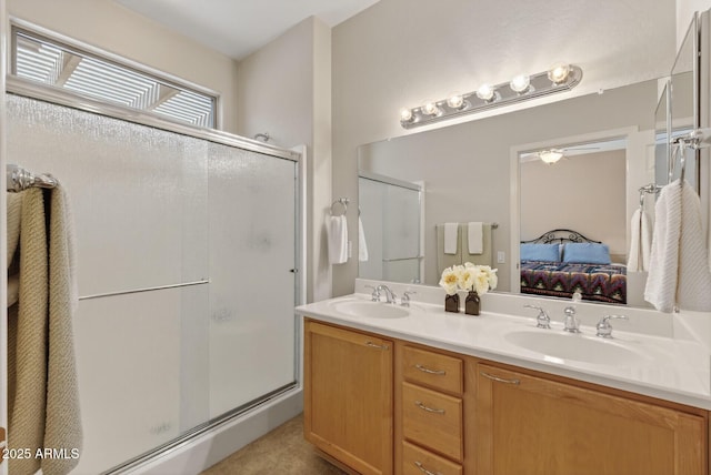 16412 W Peppertree Ct, Surprise, AZ 85387 - ensuite bathroom with a shower stall, double vanity, and ceiling fan