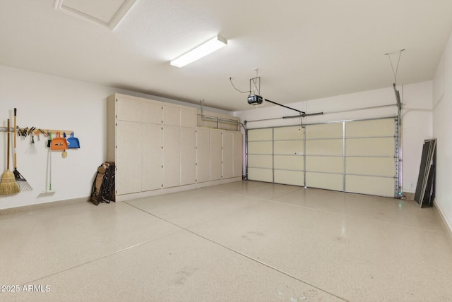 16412 W Peppertree Ct, Surprise, AZ 85387 - garage with a garage door opener and baseboards