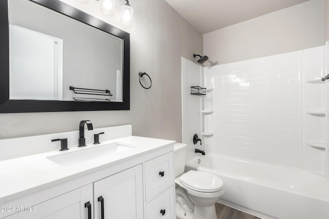 full bathroom with toilet, vanity, tub / shower combination, and hardwood / wood-style flooring