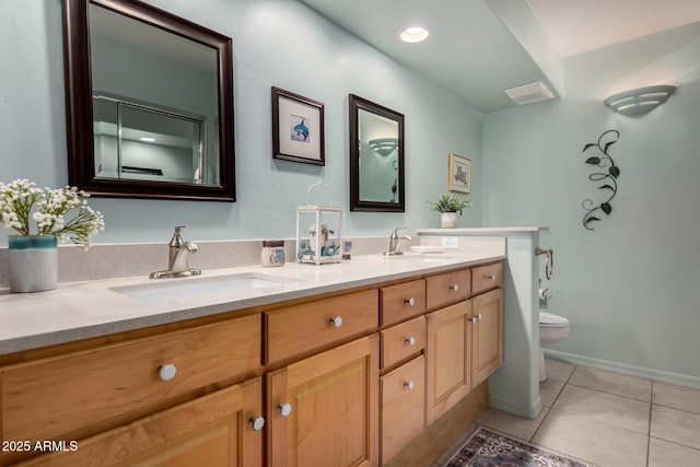 5830 E Mckellips Rd Unit 120, Mesa, AZ 85215 - bathroom with double vanity, toilet, and tile patterned floors