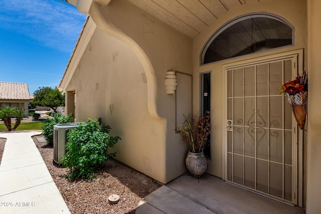 5830 E Mckellips Rd Unit 120, Mesa, AZ 85215 - property entrance featuring stucco siding and central AC