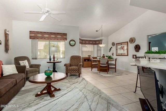5830 E Mckellips Rd Unit 120, Mesa, AZ 85215 - living room with light tile patterned flooring, lofted ceiling, ceiling fan, and baseboards