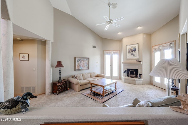 living room featuring carpet, high vaulted ceiling, plenty of natural light, and ceiling fan