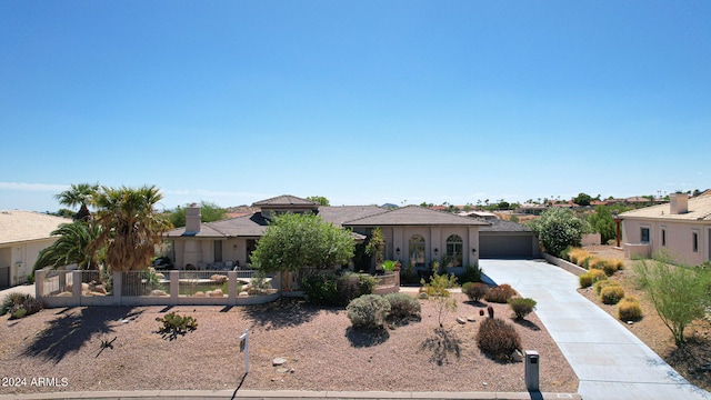 view of front of property featuring a garage