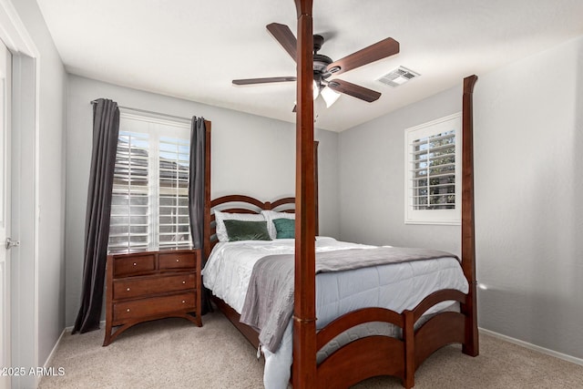 carpeted bedroom featuring ceiling fan