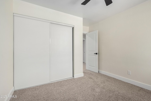 17040 N 39th Ave, Glendale, AZ 85308 - unfurnished bedroom featuring carpet floors, a closet, baseboards, and ceiling fan