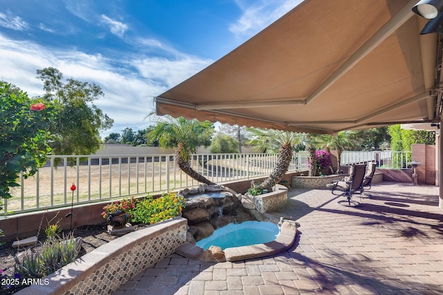 view of patio with fence