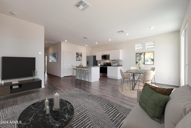 living room with dark wood-type flooring