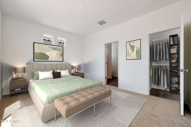 carpeted bedroom featuring a closet