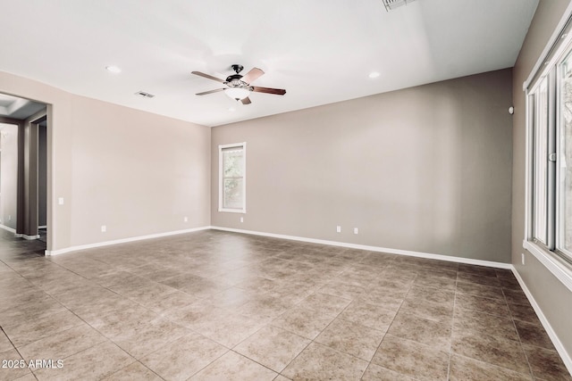 5541 W Desperado Way, Phoenix, AZ 85083 - tiled empty room with a ceiling fan, recessed lighting, and baseboards
