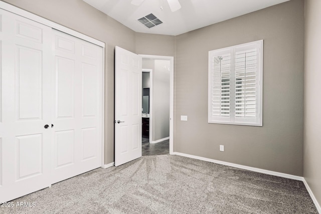 5541 W Desperado Way, Phoenix, AZ 85083 - unfurnished bedroom featuring carpet, a closet, baseboards, and a ceiling fan