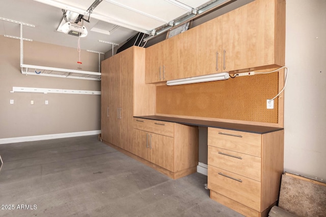 5541 W Desperado Way, Phoenix, AZ 85083 - garage featuring a garage door opener and baseboards