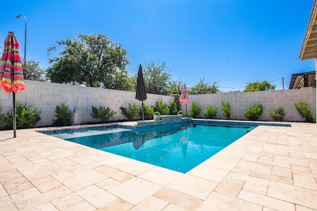 view of pool featuring a fenced in pool, a fenced backyard, and a patio area