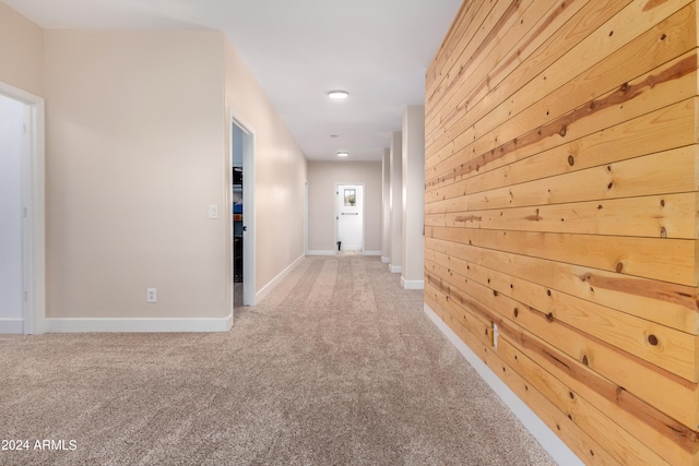 hallway with light carpet