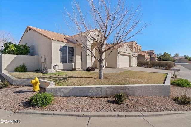 view of front of house featuring a front yard and a garage