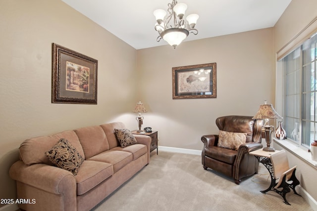 living room with light carpet and a notable chandelier