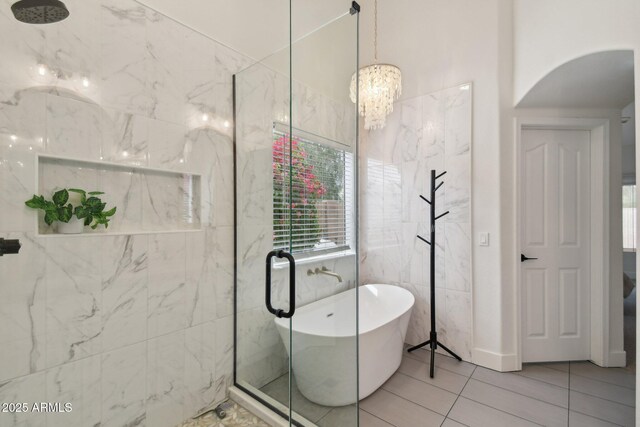 1070 S Amber St, Chandler, AZ 85286 - bathroom with a soaking tub, a marble finish shower, tile patterned floors, and a chandelier