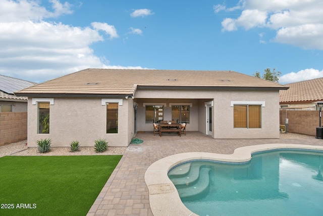 1070 S Amber St, Chandler, AZ 85286 - rear view of house featuring a patio area, stucco siding, and a tiled roof