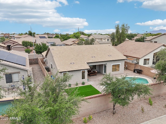 1070 S Amber St, Chandler, AZ 85286 - back of property with stucco siding, a residential view, a fenced backyard, and a patio area