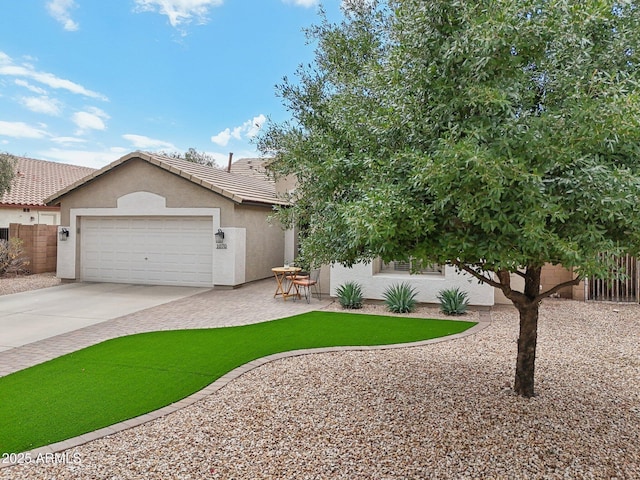 1070 S Amber St, Chandler, AZ 85286 - view of front of house with stucco siding, driveway, fence, a garage, and a tiled roof