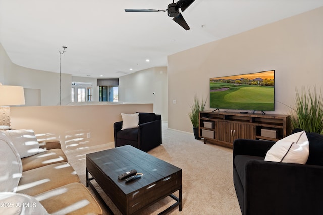 living room with light colored carpet and ceiling fan