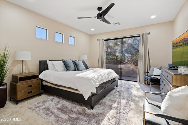 bedroom featuring access to outside, light colored carpet, and ceiling fan