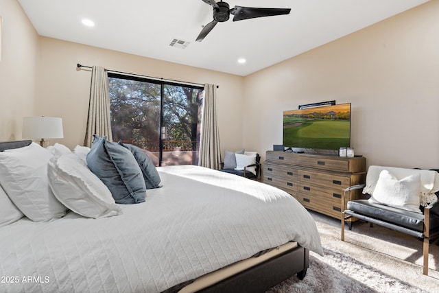 carpeted bedroom featuring ceiling fan and access to outside