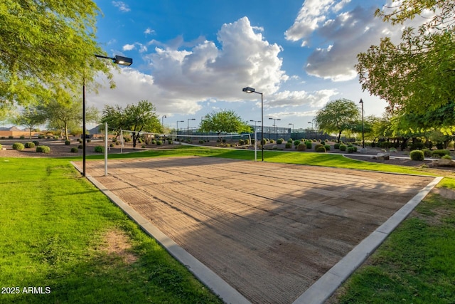 surrounding community featuring a yard and volleyball court