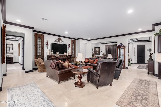 living room with ornamental molding