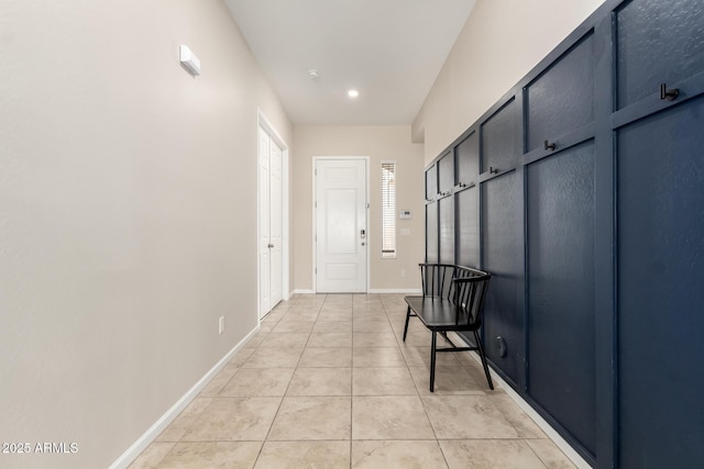 16860 W Soft Wind Dr, Surprise, AZ 85387 - hallway with light tile patterned floors, baseboards, and recessed lighting