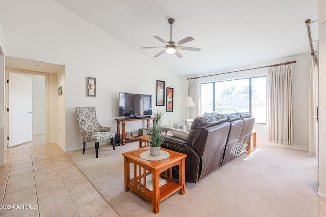 living room featuring ceiling fan, light carpet, and high vaulted ceiling