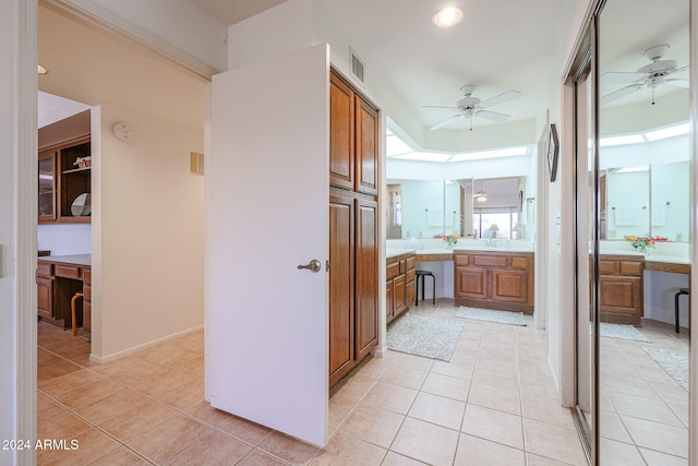 hall with light tile patterned flooring