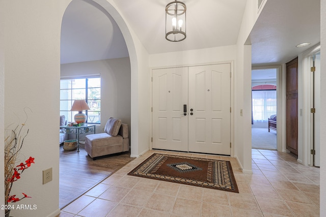 foyer entrance with light wood-type flooring