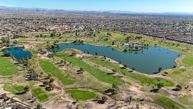 birds eye view of property featuring a water and mountain view