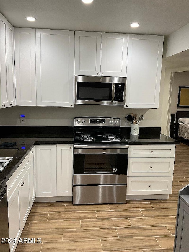 kitchen featuring white cabinets and stainless steel appliances