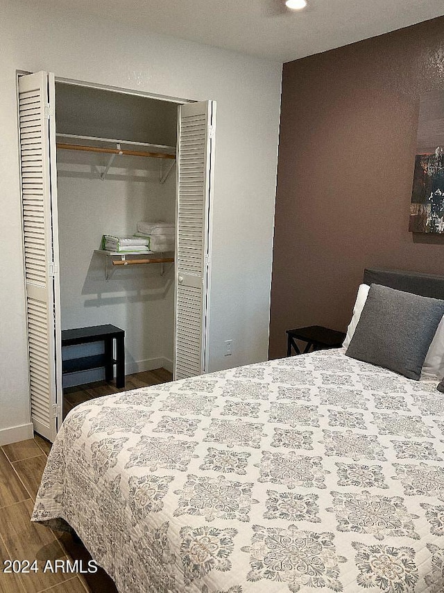 bedroom featuring hardwood / wood-style flooring