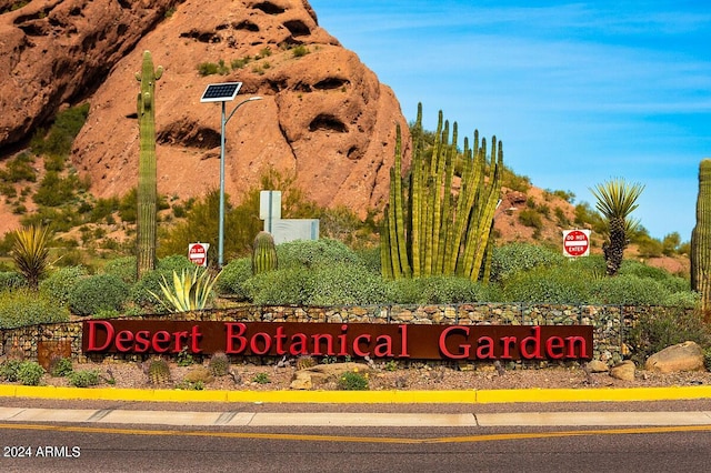 community sign featuring a mountain view