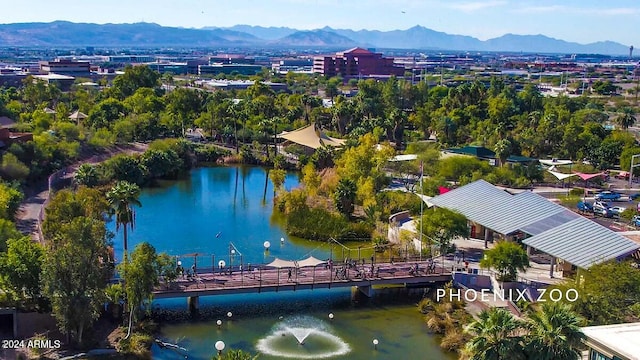 bird's eye view featuring a water and mountain view