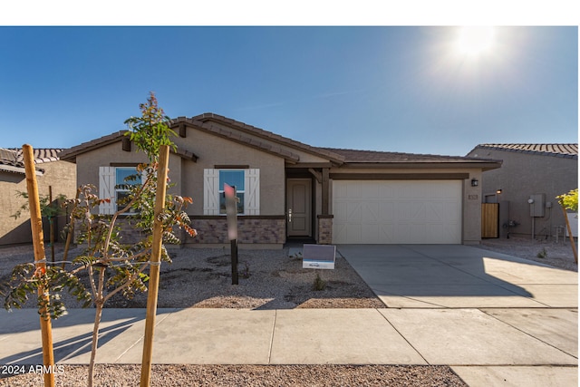 view of front of home with a garage