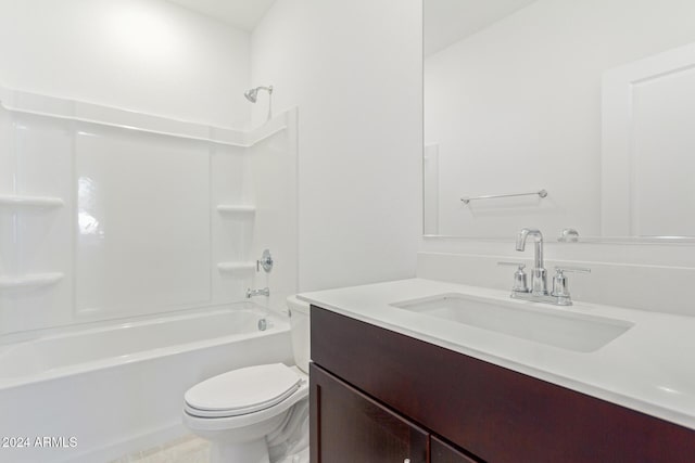 full bathroom featuring vanity,  shower combination, and toilet