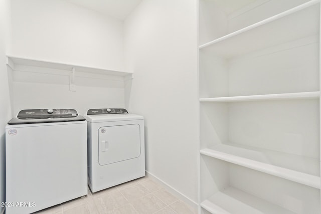 laundry area with washing machine and dryer