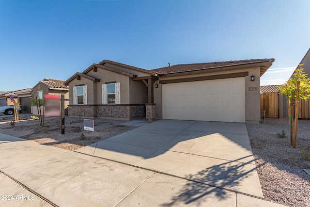 view of front of home with a garage