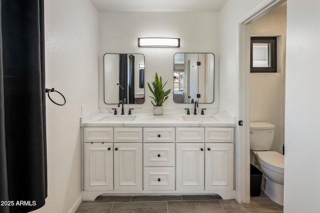 1540 E Glencove St, Mesa, AZ 85203 - bathroom with double vanity and toilet